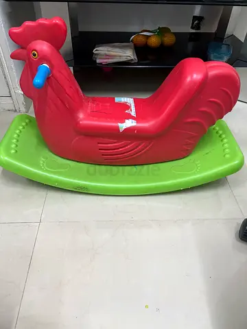 Red & green plastic rocking rooster for toddlers — good used condition