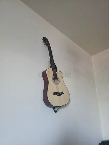 Used full-size acoustic guitar - good condition