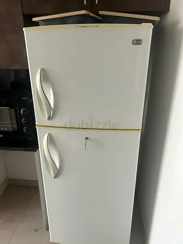 LG refrigerator, excellent condition. MOVE OUT SALE