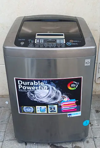 Fully automatic LG 14kg topload washing machine, gray color, condition good working.