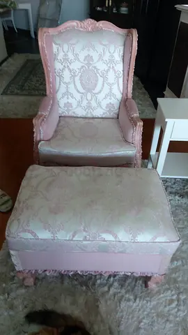 Vintage pink carved accent armchair with patterned upholstery.also included is an ottoman