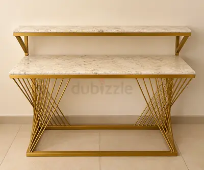Gold metal console table with marble tops — elegant hallway/entry table