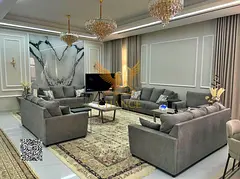 Includes water, electricity, central air conditioning, and furniture; located in one of Ajman's most
