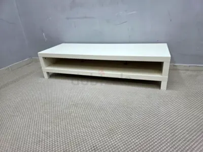 Low white TV stand / media console with shelf