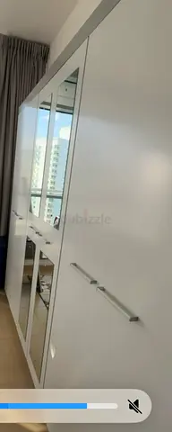 White mirrored 4-door wardrobe in good condition and King Size Bed with Mattress