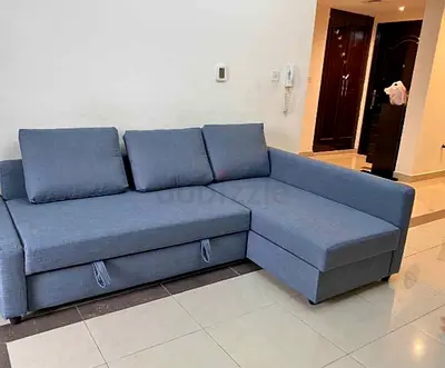 IKEA L shap Sofa store cum bed you can fix the storage lift or Right any side you want is available
