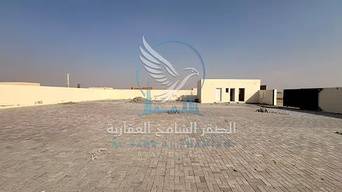 Huta for rent in Sajaa, Sharjah, 10,000 sq. ft., fully interlocked, with office, bathroom, kitchen, and 16 kW electricity.
