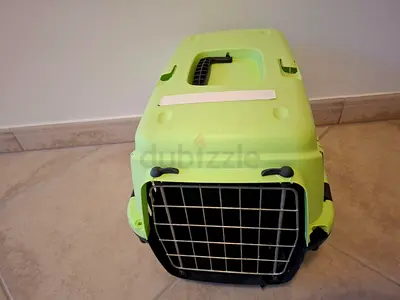 Sturdy Green Plastic Pet Carrier with Metal Door