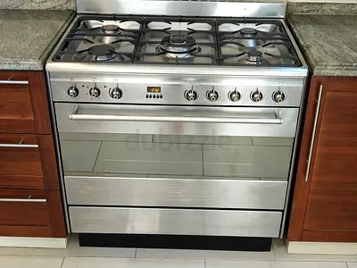 Smeg Brand top gas oven electric cooker 90cm