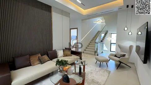 An upscale villa featuring a modern design and spacious areas, distinguished by a practical layout