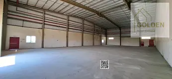 13-Meter Height | Warehouse for Rent on a Main Road in UAQ | Spacious External Area for Loading & Un