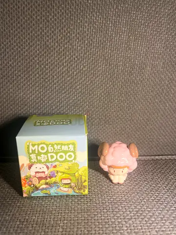 Cute MOMODOO collectible blind box figure with pink sheep toy