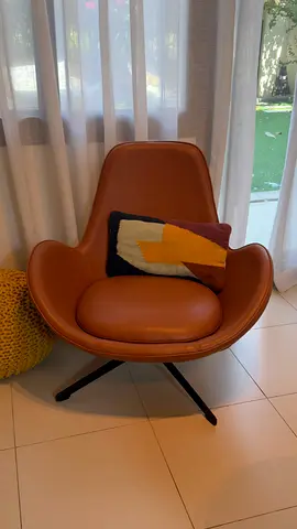 Modern brown leather swivel lounge chair with cushion. Original price 3,250 AED from ebarza