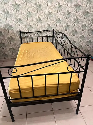 Black metal day bed
