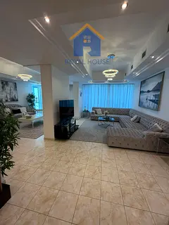 A spacious, high-end apartment is available for sale in the Al Majaz 3 area, boasting a strategic an