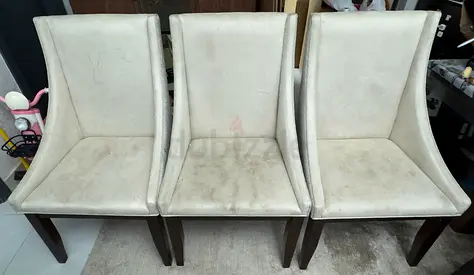 Set of 3 beige upholstered dining chairs with wooden legs - used