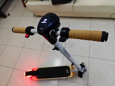 Yvolution YES Electric Scooter Made(Ireland) original charger location sharjah Near Abushagara 🚥 si