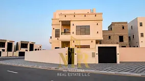 Corner villa in Al Helio 2, Ajman. Two floors and a rooftop terrace with a private pool. Freehold ow