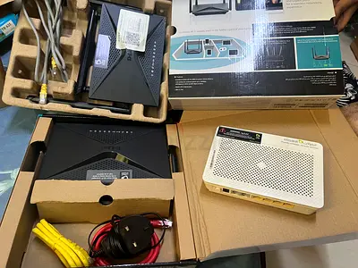 Bundle of Routers and Modem with Cables - Good Working Condition