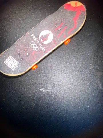 Teck deck pro, it has grate grip made in france paris2024and i added a cool design to it if you like