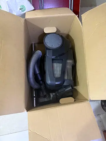 Used canister vacuum cleaner - compact, works fine
