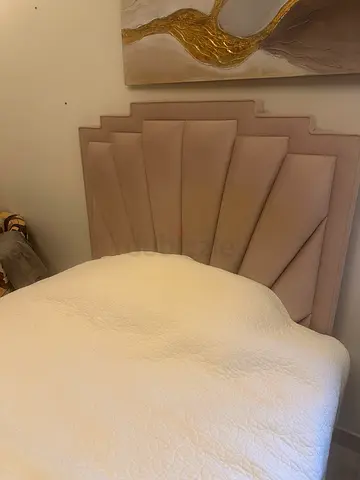 Elegant upholstered headboard in pink, good condition