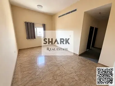 2BR apartment in Al Muwaihat 1, Ajman, with 2 bathrooms. AED 33K yearly, payable in 4 installments. Security deposit by cheque.