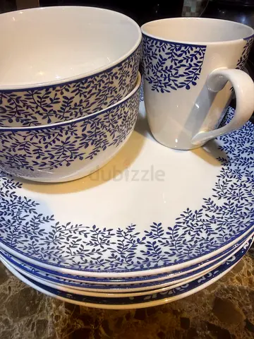 Blue and white ceramic dinnerware set - plates, bowls and mugs (used)