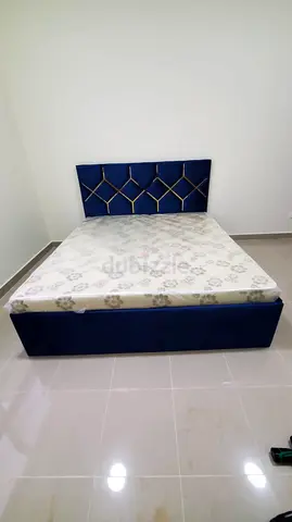 Blue velvet double bed with mattress - good condition