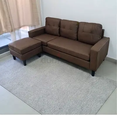 Brown 3-seater Fabric Sofa with Ottoman - Good Condition with a coffee table