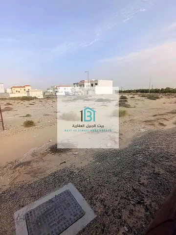 Two Adjacent Corner Plots for Sale in Al Raqeeba