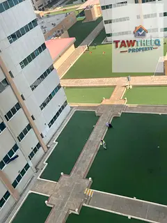Two-bedroom apartment with a living room for annual rent in Ajman One Towers