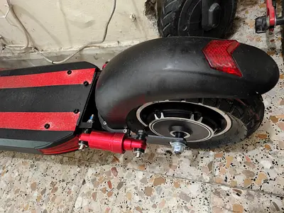 Used Electric Kick Scooter — Rear-Wheel Motor, Foldable Deck, Red/Black