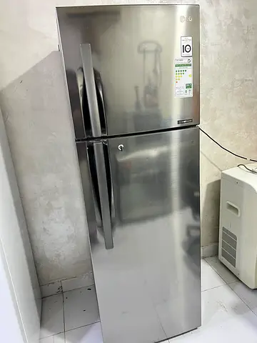 LG Stainless Steel Side-by-Side Refrigerator - Good Condition