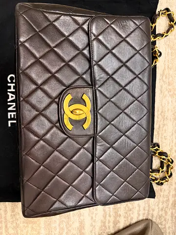 Authentic Vintage Chanel Classic Maxi Flap Quilted Leather Shoulder Bag - Brown, Gold Hardware.