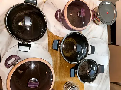 Cooking pots and one steel sauce pan