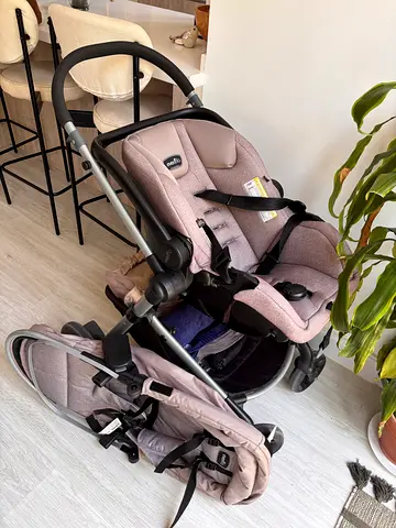Evenflo stroller frame with car seat including base