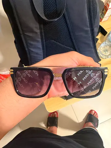 Black women's designer-style sunglasses - gently used