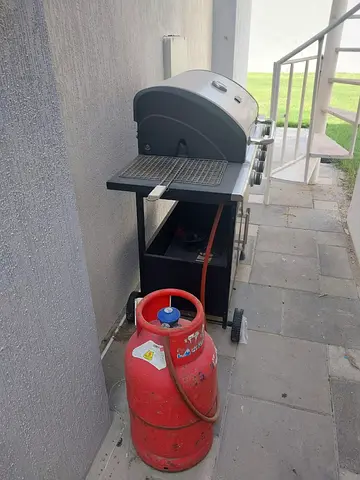 Used Gas BBQ Grill with Propane Cylinder - Good Working Condition