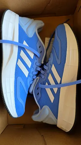 Light blue Adidas running shoes - size not specified, like new