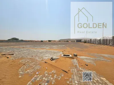 AED 6 per Sq. Ft. | Asphalted & Mesh-Fenced Land for Rent Near Mohammed Bin Zayed Road, Umm Al Quwain