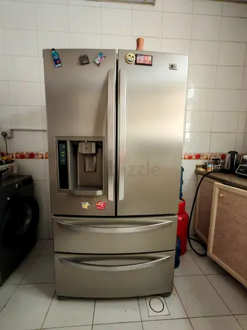Used double - door refrigerator in good working condition