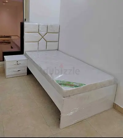 Single white bed with headboard and mattress - like new