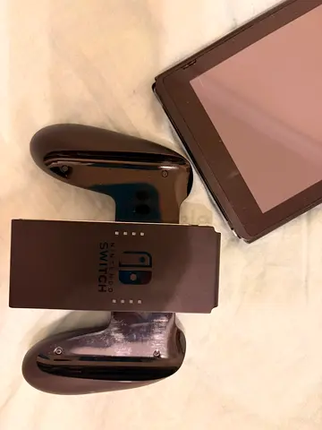 Nintendo Switch console with Joy-Con grip and joy cons and cover - good working condition