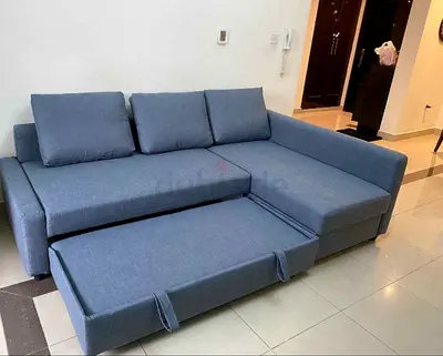 IKEA L shap Sofa store cum bed you can fix the storage lift or Right any side