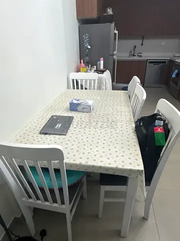 White wooden dining table with 4 chairs - good condition and mattress king size free for collection