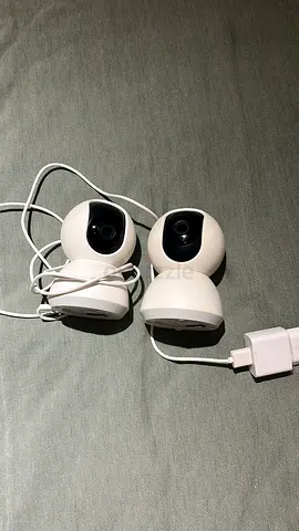 Xiomi Pair of small Wi‑Fi security cameras with chargers