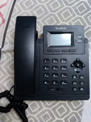 Yealink SIP-T31P Entry-level IP Power over Ethernet Corded Phone with 2 Lines, HD Voice and 2.3 Inch