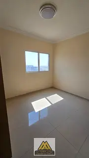 Annual 1BR in Al Jurf 3, Ajman. 2 baths, balcony, built-in wardrobes, second tenant, near Sheikh Moh