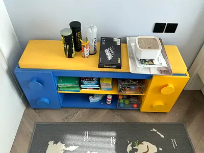 Low blue and yellow kids storage bench / TV unit